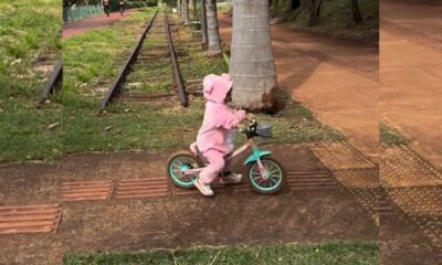 pai-coloca-filha-de-2-anos-para-se-exercitar-em-bicicleta-sem-rodinhas